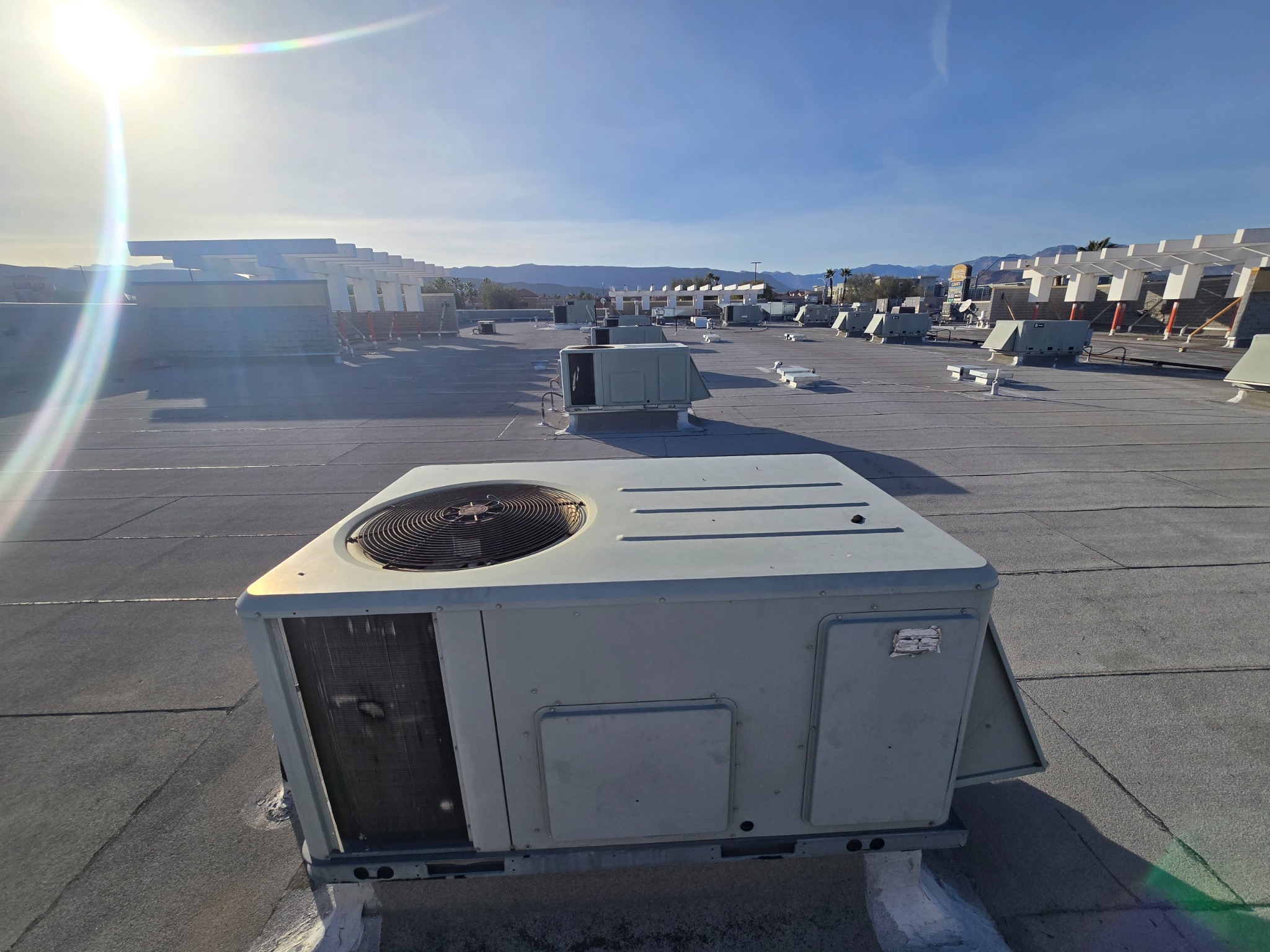 Rooftop HVAC unit and roof surface